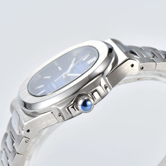 Side view of Nautilus style Seiko mod watch, polished stainless steel case and silver crown detail