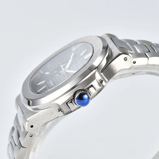 Side view of open heart Nautilus style Seiko mod watch, polished stainless steel case and silver crown detail