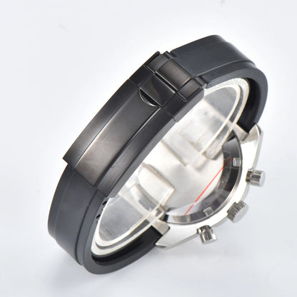 Solid brushed case back of silver chronograph speedmaster Seiko mod watch, black rubber strap with safety buckle