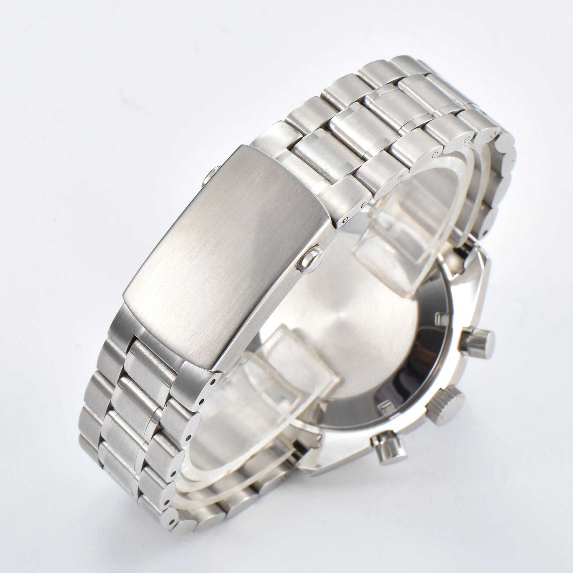 Solid brushed case back of silver chronograph Seiko mod watch, stainless steel bracelet