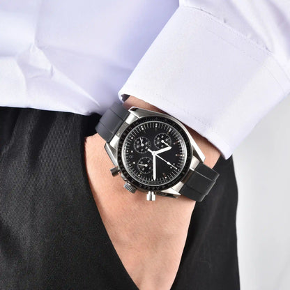 Men's silver black chronograph Seiko mod watch on wrist, casual daily wear shot