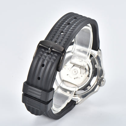 Transparent case back and pin buckle of silver Aquanaut style Seiko mod watch with black rubber strap