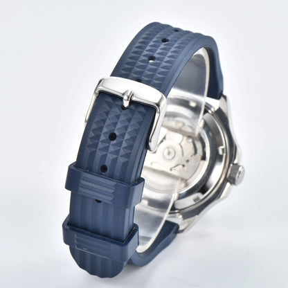 Transparent case back and pin buckle of silver Aquanaut style Seiko mod watch with blue rubber strap