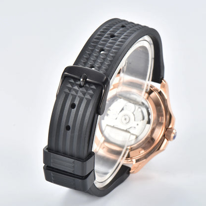 Transparent case back and pin buckle of rose gold Aquanaut style Seiko mod watch with black rubber strap