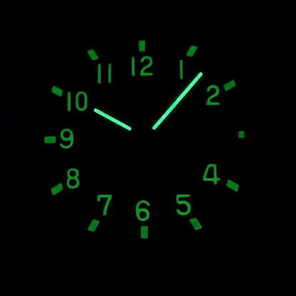 Luminous green dial and hands of rose gold Aquanaut style Seiko mod watch in dark environment