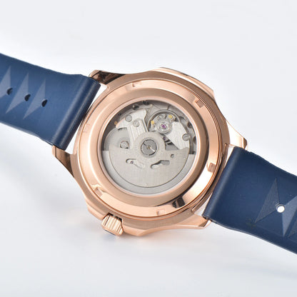 Clear case back showing Seiko NH35 automatic movement in rose gold blue Aquanaut style Seiko mod watch