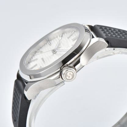 Side view of silver white Aquanaut style Seiko mod watch, polished stainless steel case and crown detail