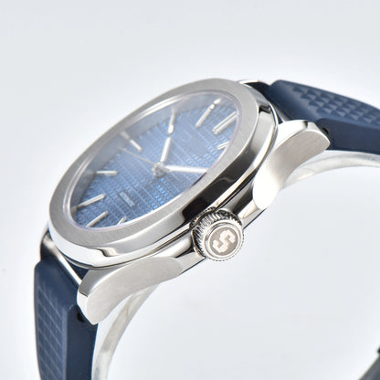Side view of silver blue Aquanaut style Seiko mod watch, polished stainless steel case and crown detail