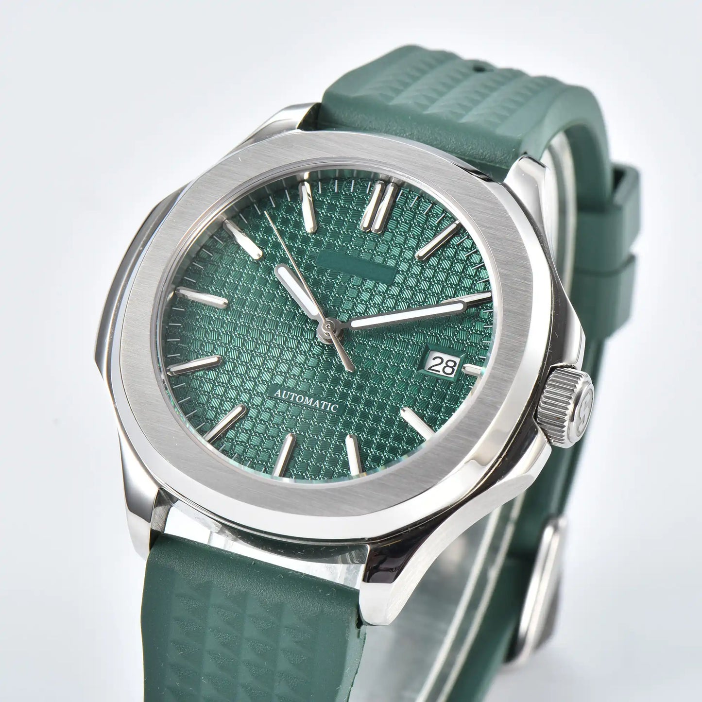 Side view of silver green Aquanaut style Seiko mod watch, polished stainless steel case and crown detail