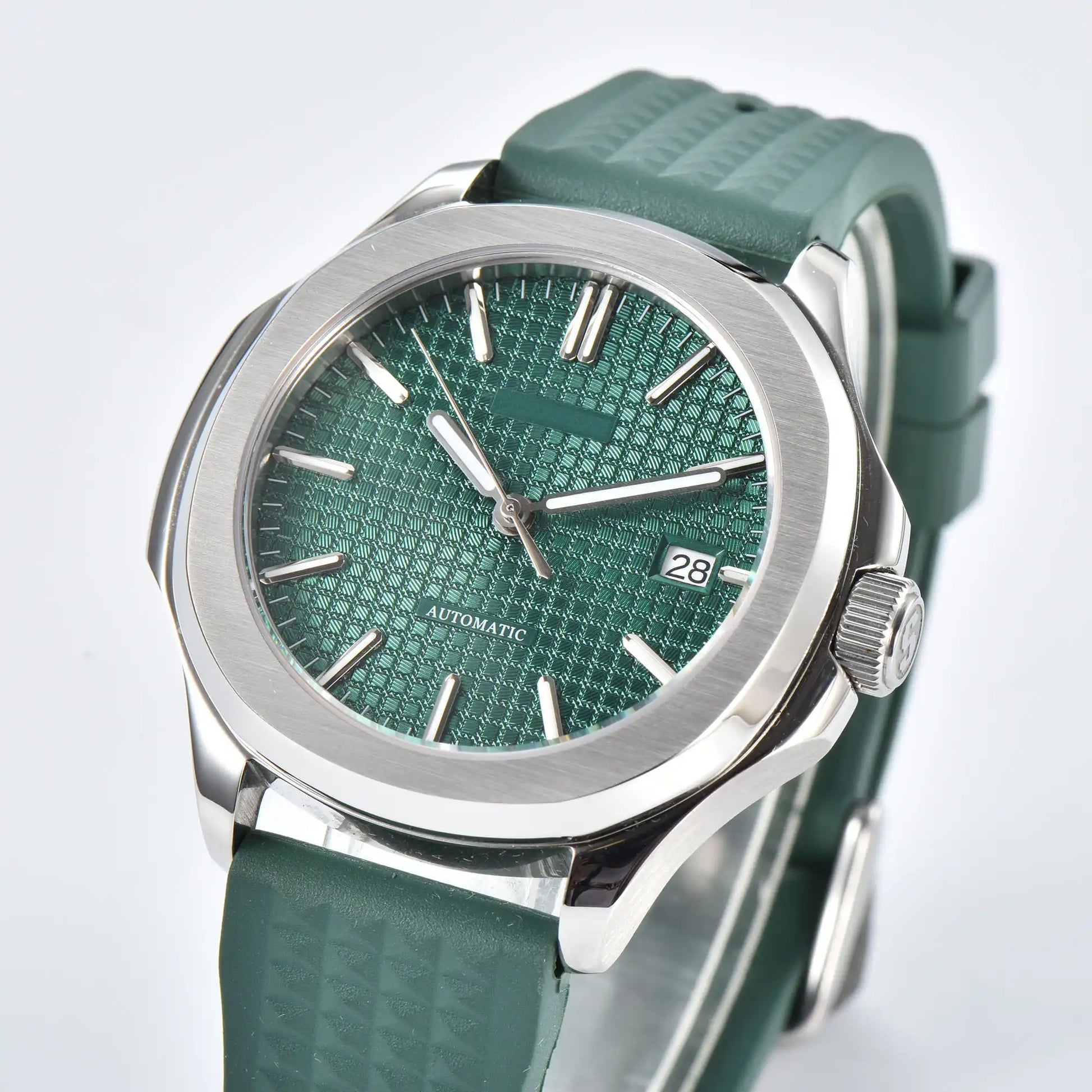 Side view of silver green Aquanaut style Seiko mod watch, polished stainless steel case and crown detail