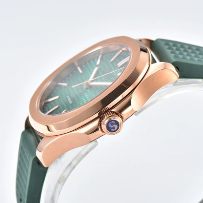 Side view of rose gold green Aquanaut style Seiko mod watch, polished stainless steel case and crown detail