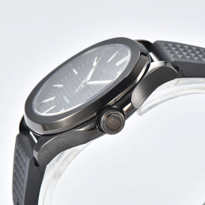 Side view of stealth black Aquanaut style Seiko mod watch, polished stainless steel case and crown detail