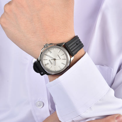 Silver white Aquanaut style Seiko mod watch with black rubber strap on wrist, business lifestyle shot