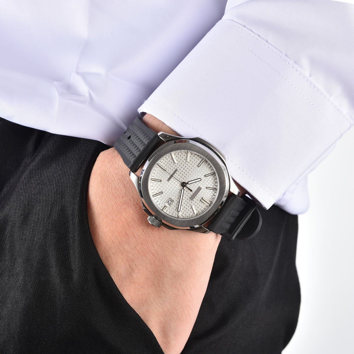 Men's silver white Aquanaut style Seiko mod watch on wrist, casual daily wear lifestyle shot