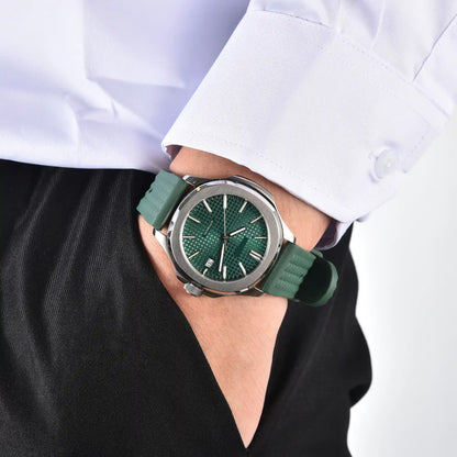 Men's silver green Aquanaut style Seiko mod watch on wrist, casual daily wear lifestyle shot
