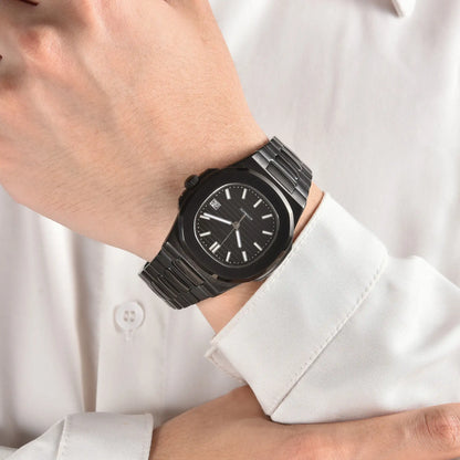Full black Nautilus style Seiko mod watch with stainless steel bracelet on wrist, business lifestyle shot