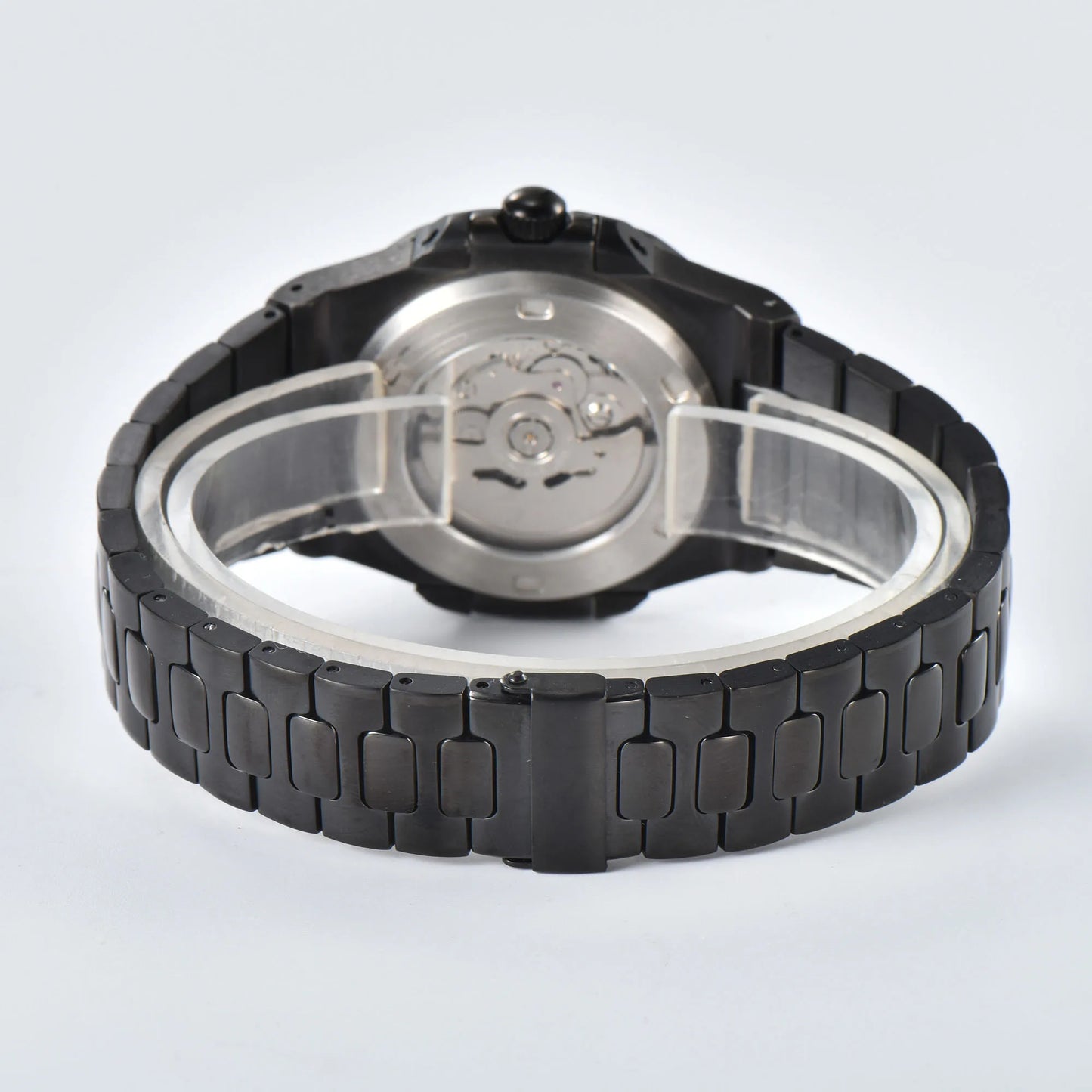 Transparent case back and deployment clasp of full black Nautilus style Seiko mod watch with stainless steel bracelet