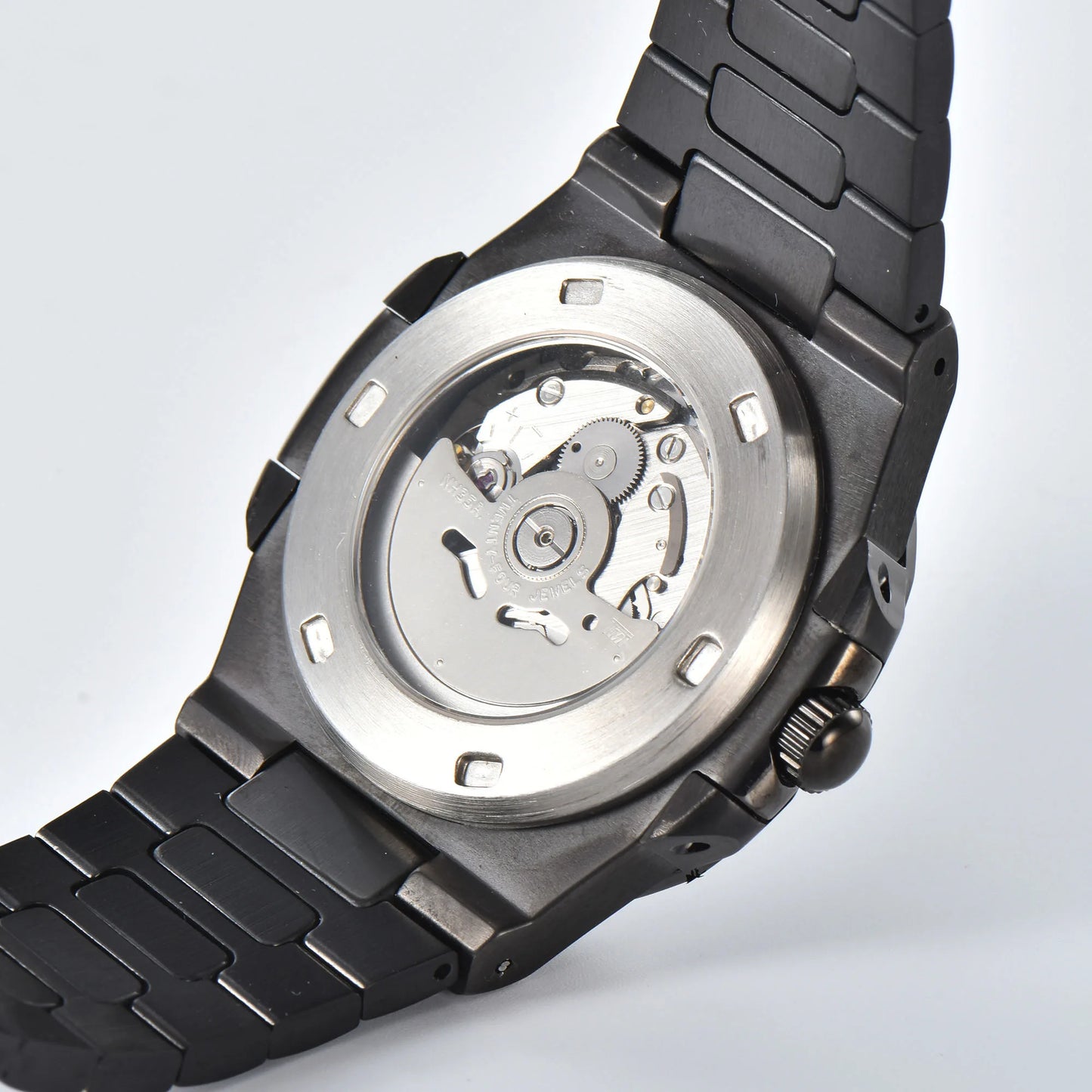 Clear case back showing Seiko NH35 automatic movement in full black Nautilus style Seiko mod watch