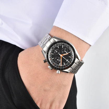 Men's silver black chronograph speedmaster Seiko mod watch on wrist, casual daily wear shot