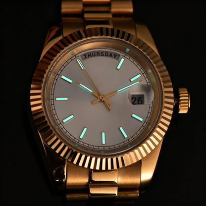 Luminous dial and hands of gold Seiko mod watch in dark environment