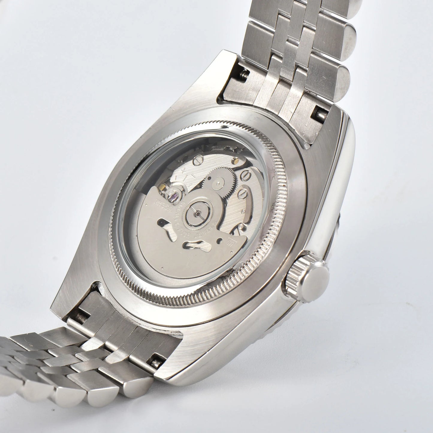 Custom Seiko mod watch with exhibition caseback showing Seiko NH35 automatic movement with custom rotor
