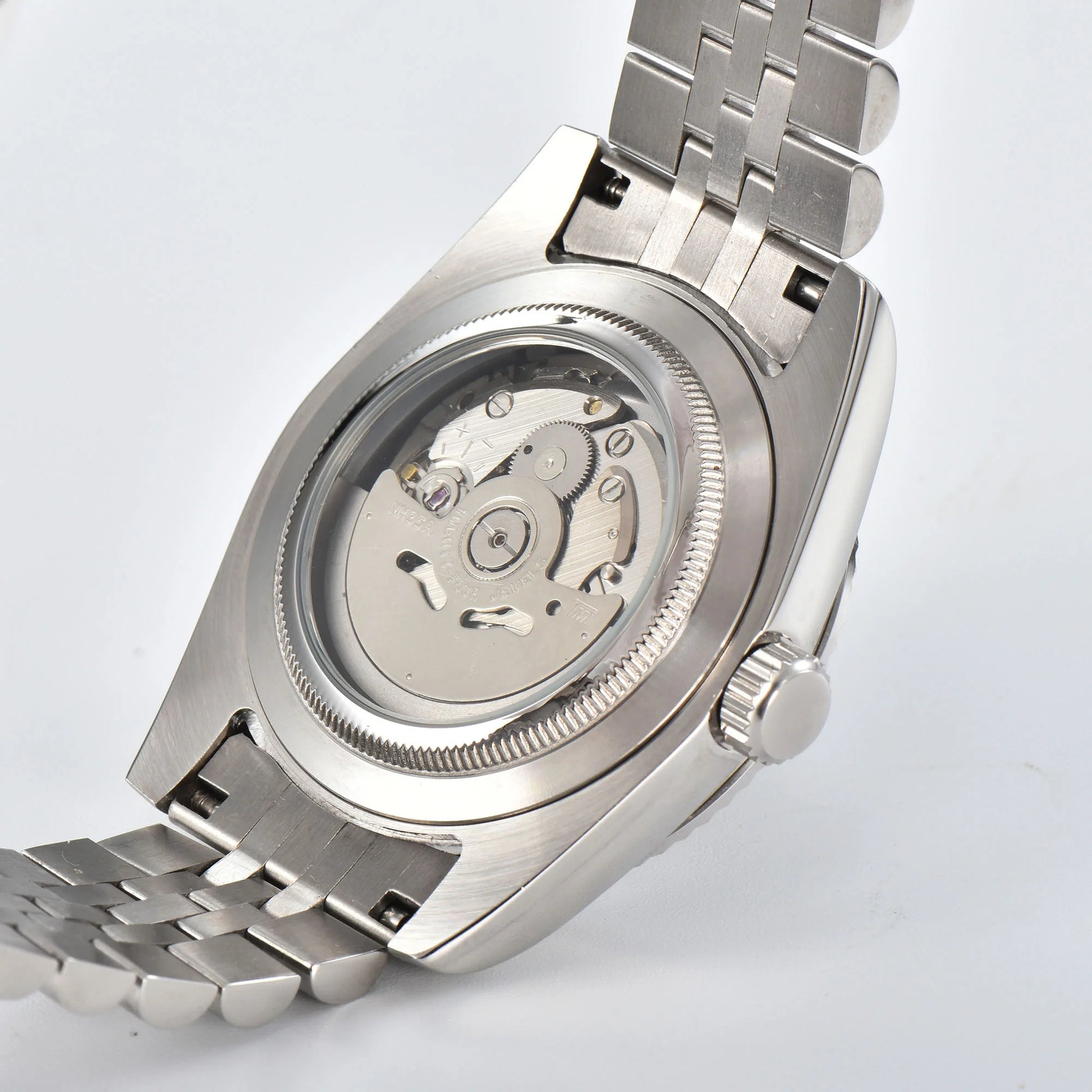 Custom Seiko mod watch with exhibition caseback showing Seiko NH35 automatic movement with custom rotor