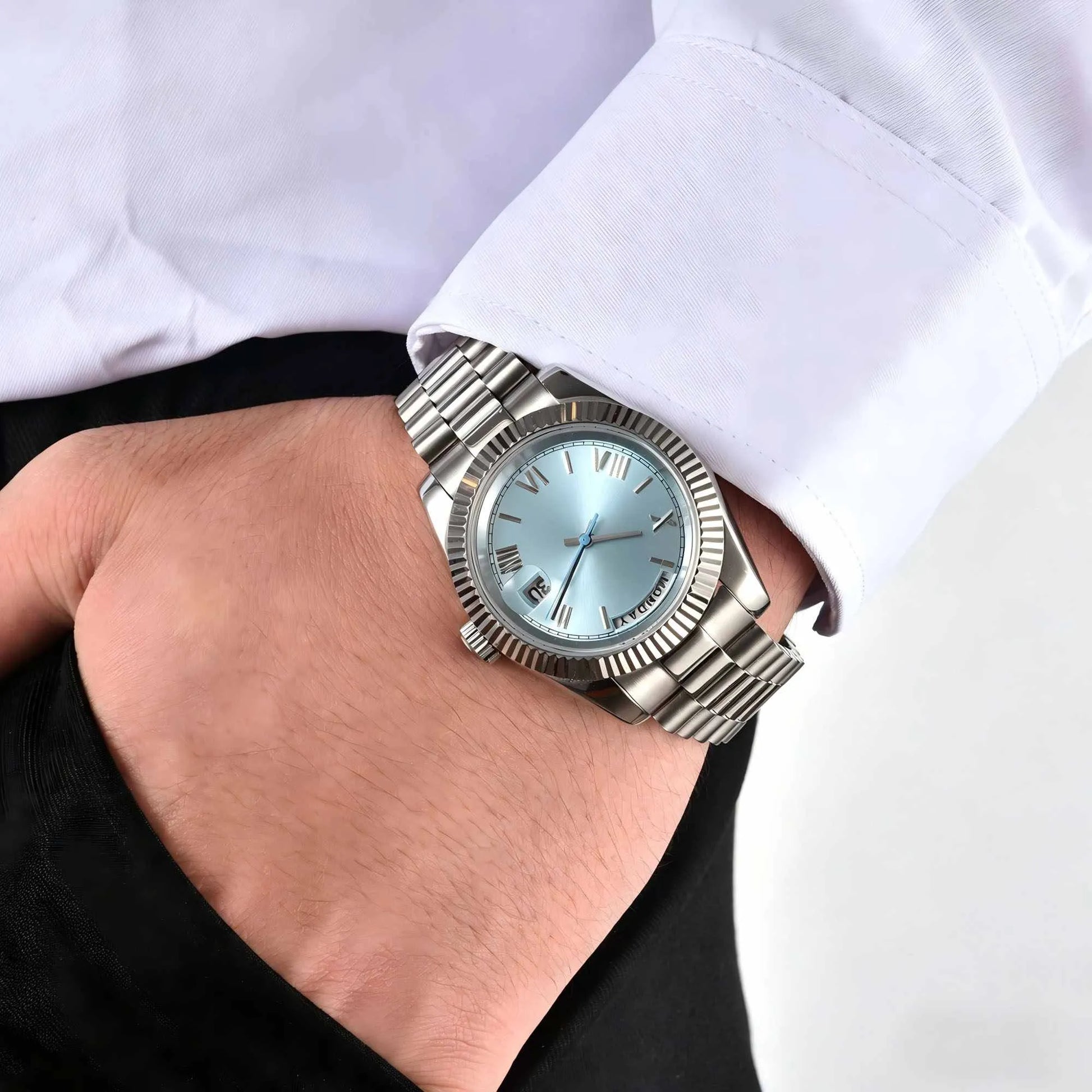 Men's custom Seiko mod watch on wrist with dress shirt
