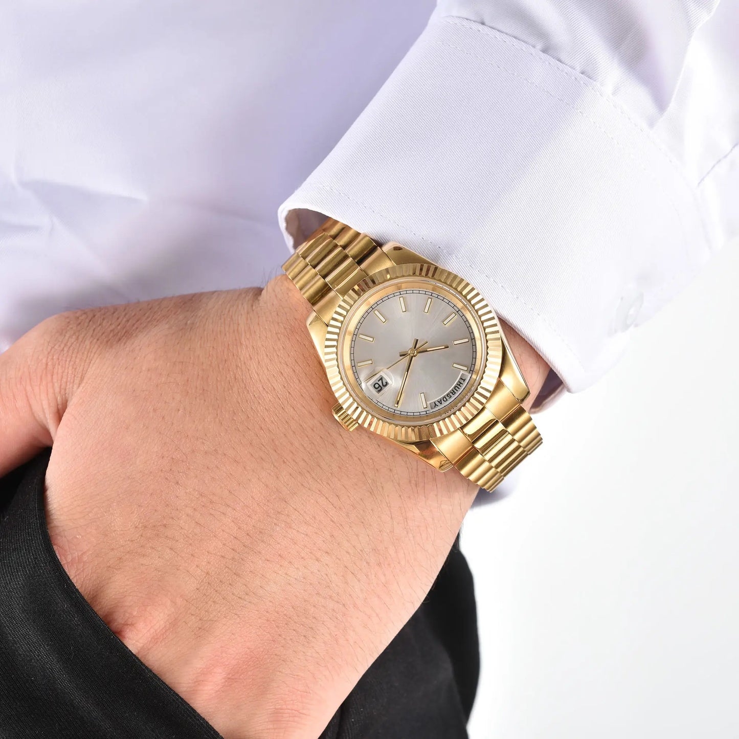 Men's gold Seiko mod watch on wrist, daily business lifestyle shot