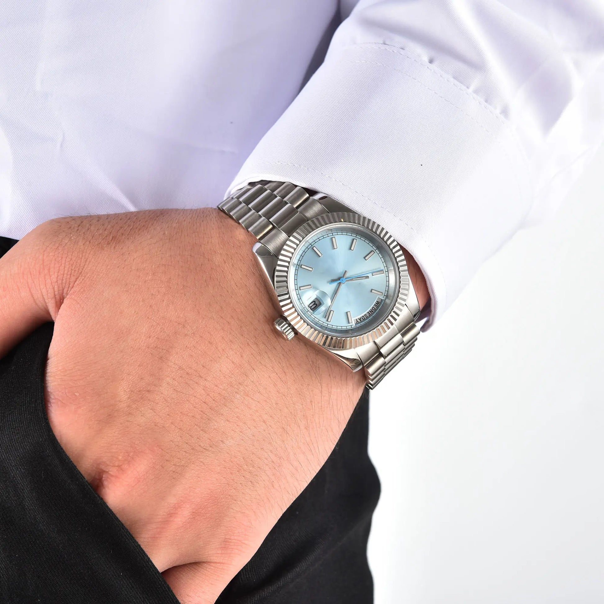 Men's custom Seiko mod watch on wrist with dress shirt