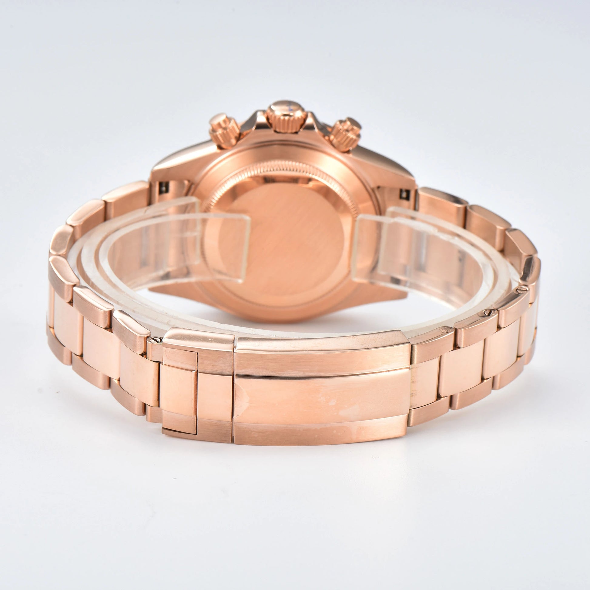 Solid case back and rose gold stainless steel bracelet clasp of rainbow bezel Daytona style Seiko mod watch