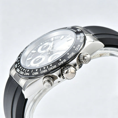Side angle view of black panda Daytona style Seiko mod watch, black ceramic tachymeter bezel detail
