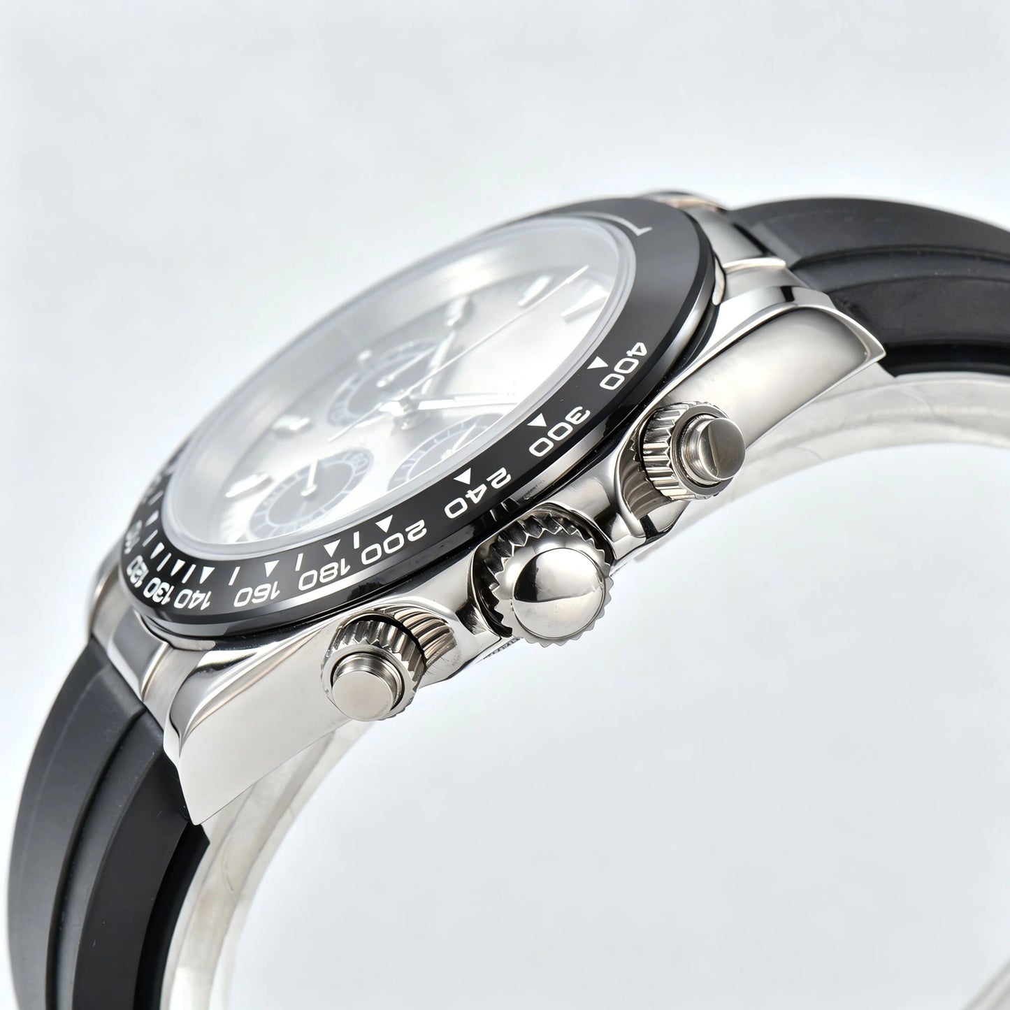 Side angle view of VK63 Daytona style Seiko mod watch, black ceramic tachymeter bezel detail