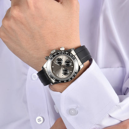 Men's sunburst gray VK63 Daytona style Seiko mod chronograph watch on wrist, business lifestyle shot