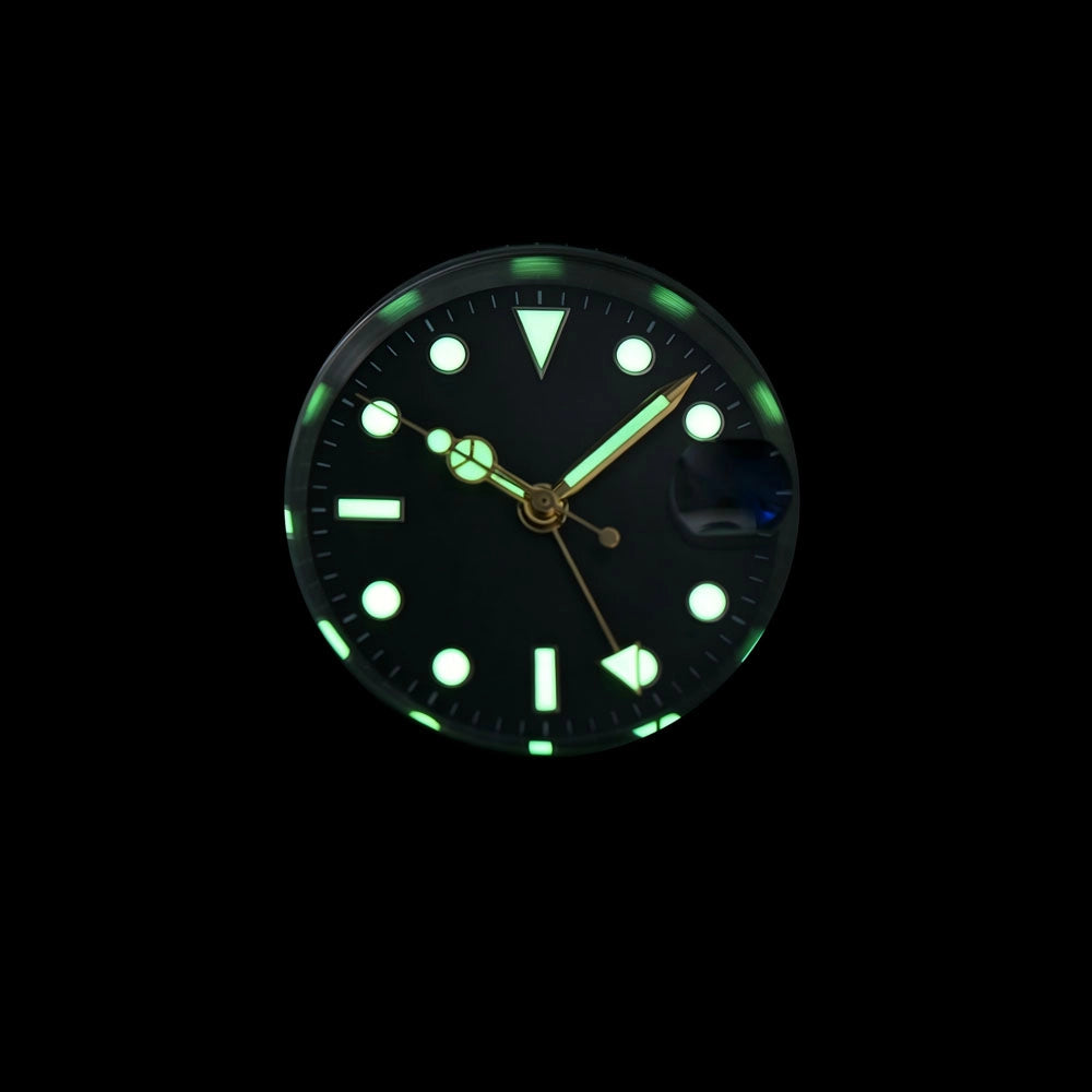Low light close-up of Seiko mod GMT watch hands showing strong C3 Super-LumiNova 