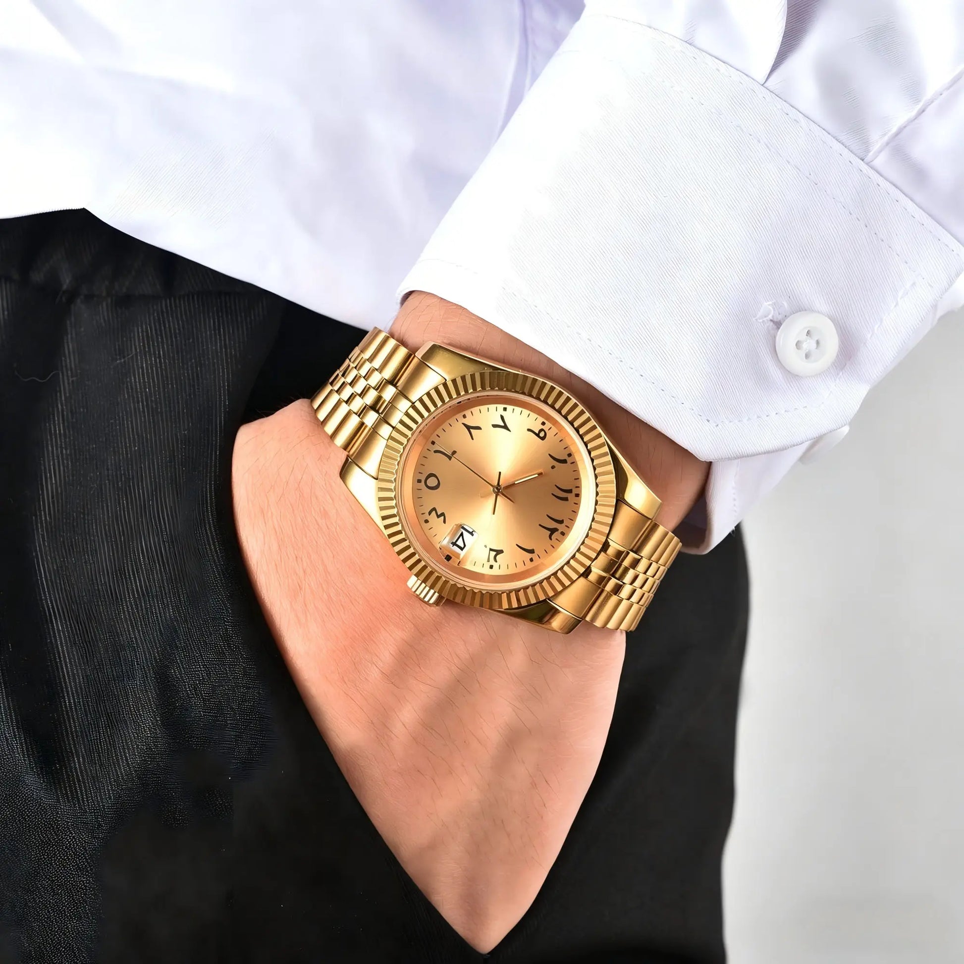 Wrist shot of custom Seiko mod watch worn with a formal suit, showcasing the polished finish and refined dial details