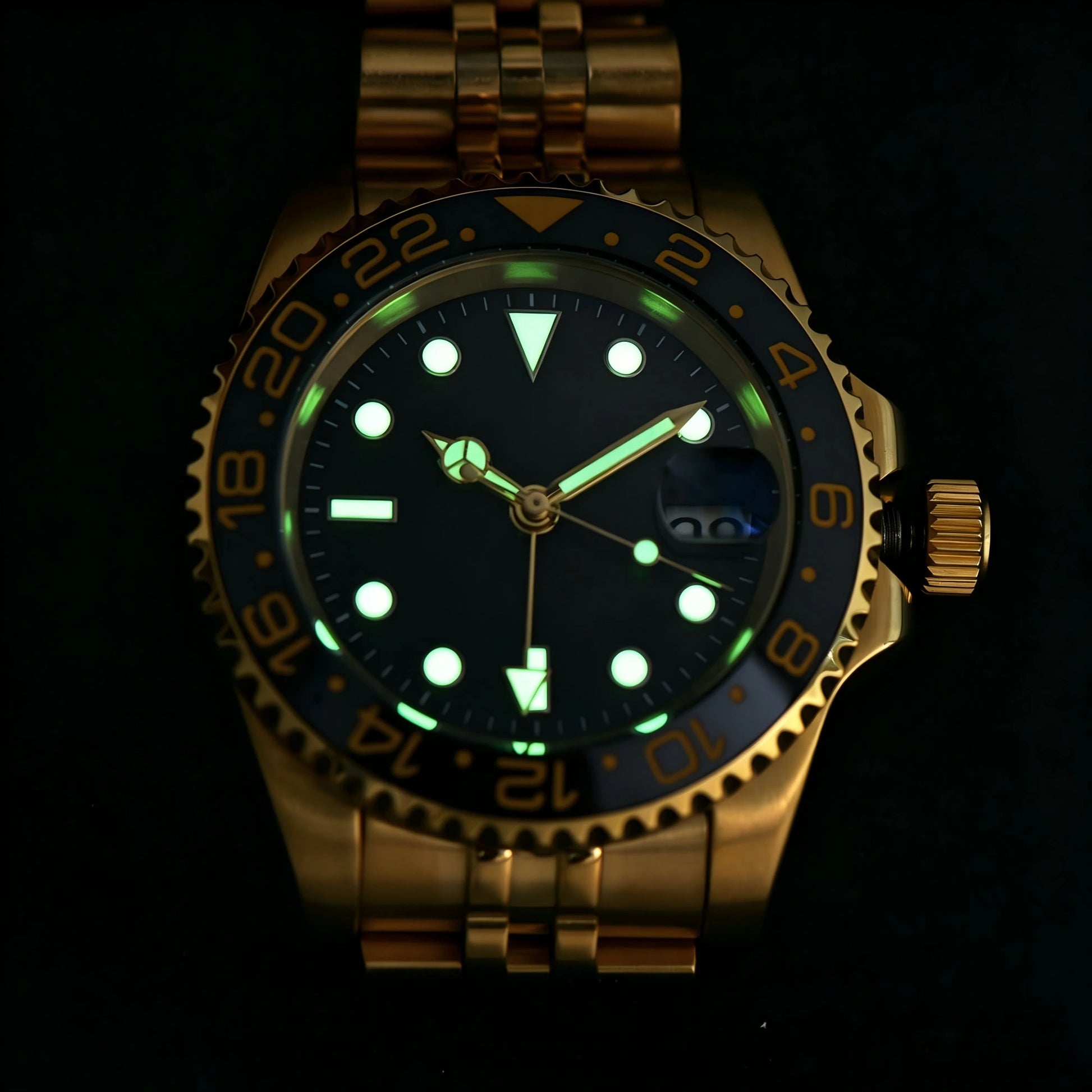 Low light close-up of Seiko mod watch dial showing strong C3 Super-LumiNova on custom GMT hands and indices
