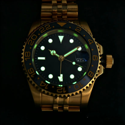 Low light close-up of Seiko mod watch dial showing strong C3 Super-LumiNova on custom GMT hands and indices