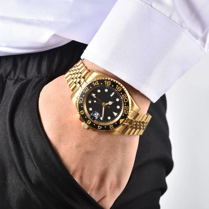 Wrist shot of custom GMT Seiko mod watch worn with a formal suit, showcasing the polished finish and refined dial details