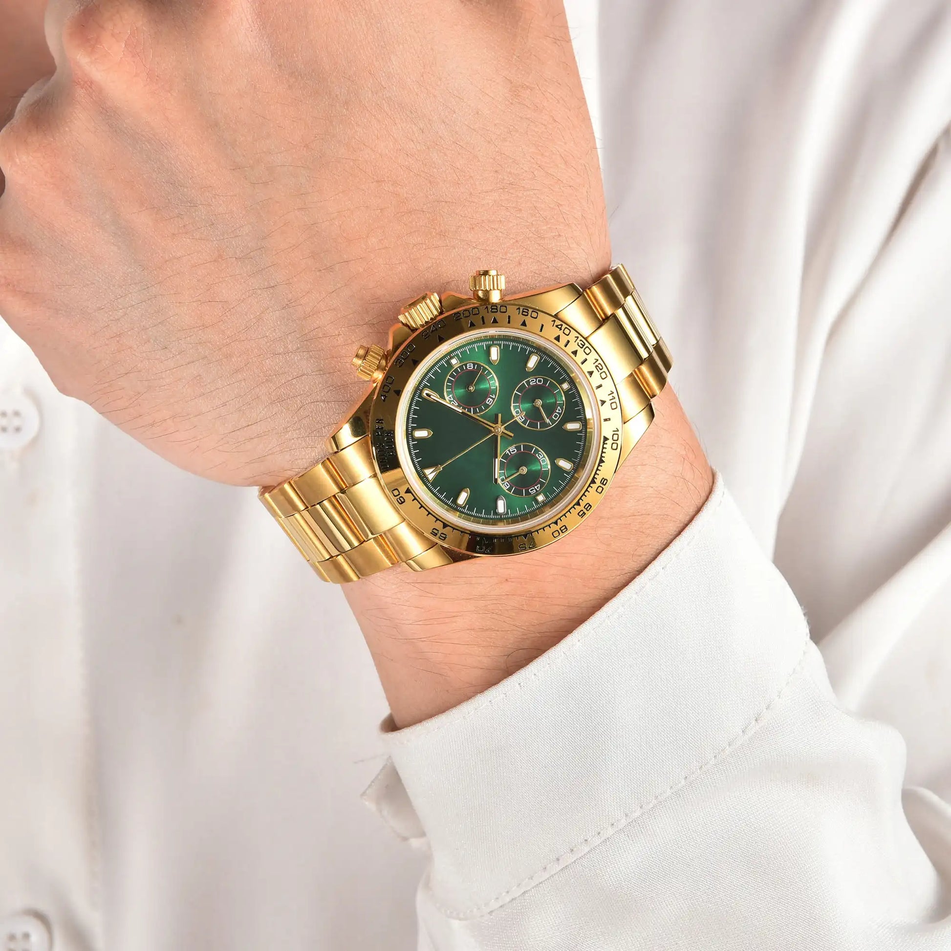 Men's gold green VK63 Daytona style Seiko mod chronograph watch on wrist, business lifestyle shot