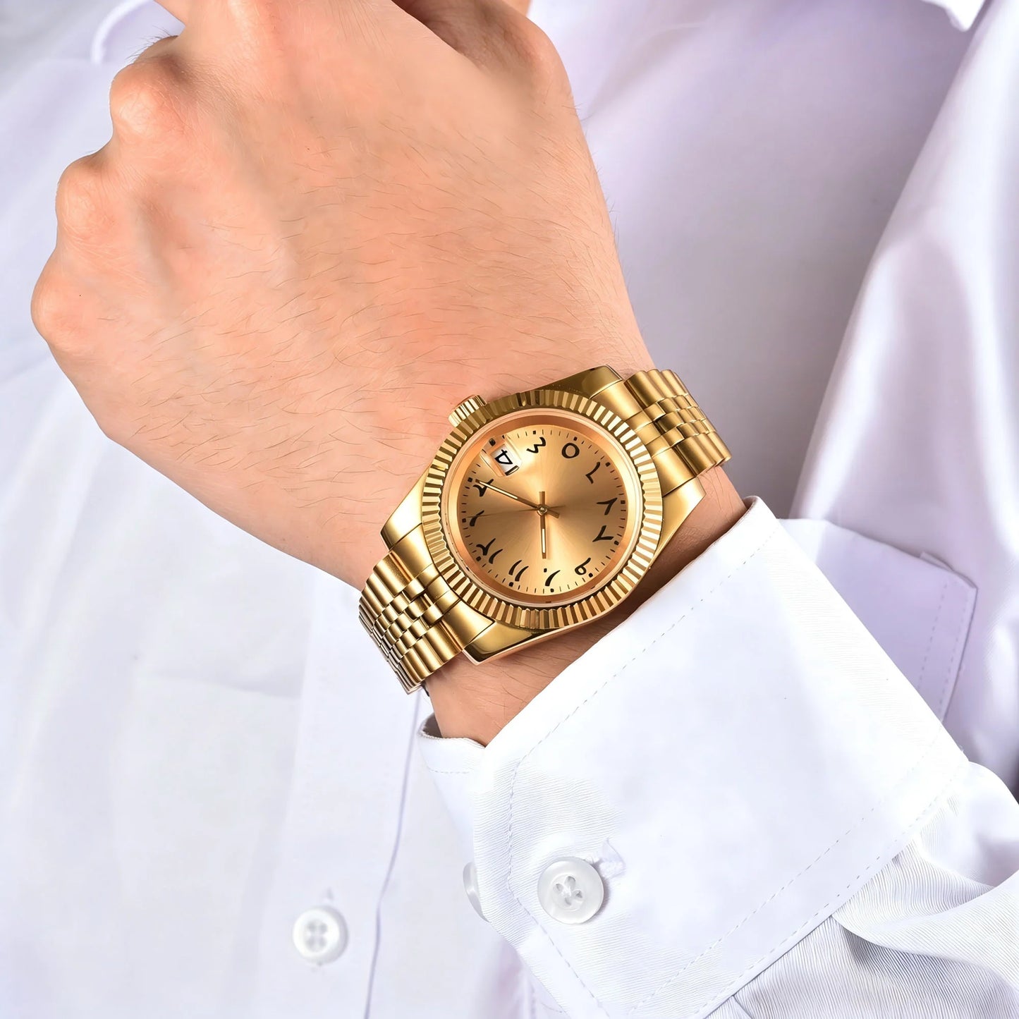 Wrist shot of custom Seiko nh35 datejust mod watch with sapphire crystal and Arabic gold dial