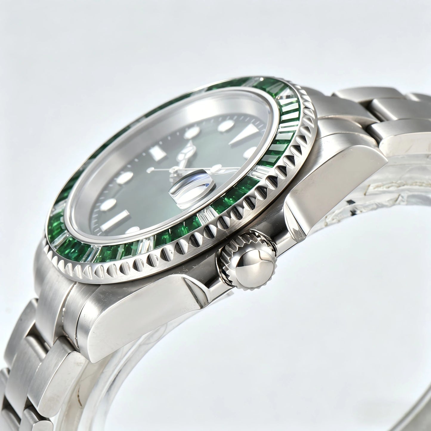 Green gem bezel and side crown detail of Submariner style Seiko mod watch