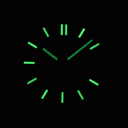 Luminous green dial and hands of NH35 Nautilus style Seiko mod watch in dark environment