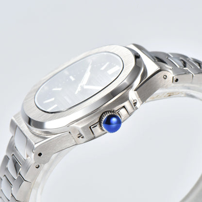 Side view of Nautilus style Seiko mod watch, polished stainless steel case and silver crown detail