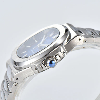 Side view of Nautilus style Seiko mod watch, polished stainless steel case and silver crown detail
