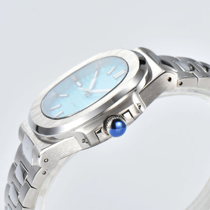 Side view of Nautilus style Seiko mod watch, polished stainless steel case and silver crown detail