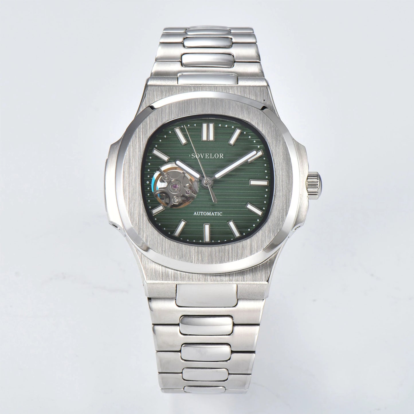 Custom Nautilus style Seiko mod watch, green open heart dial with stainless steel bracelet, NH38 automatic movement