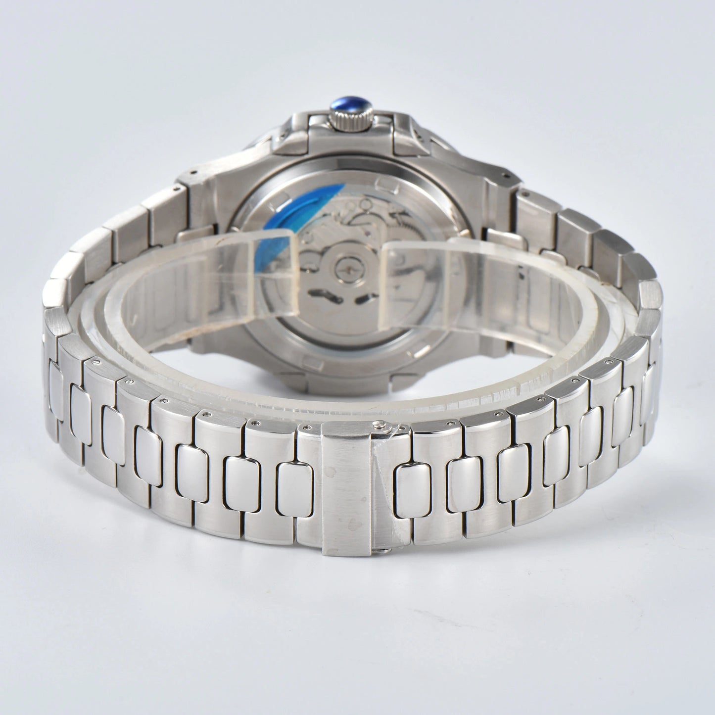 Transparent case back and deployment clasp of open heart Nautilus style Seiko mod watch with stainless steel bracelet