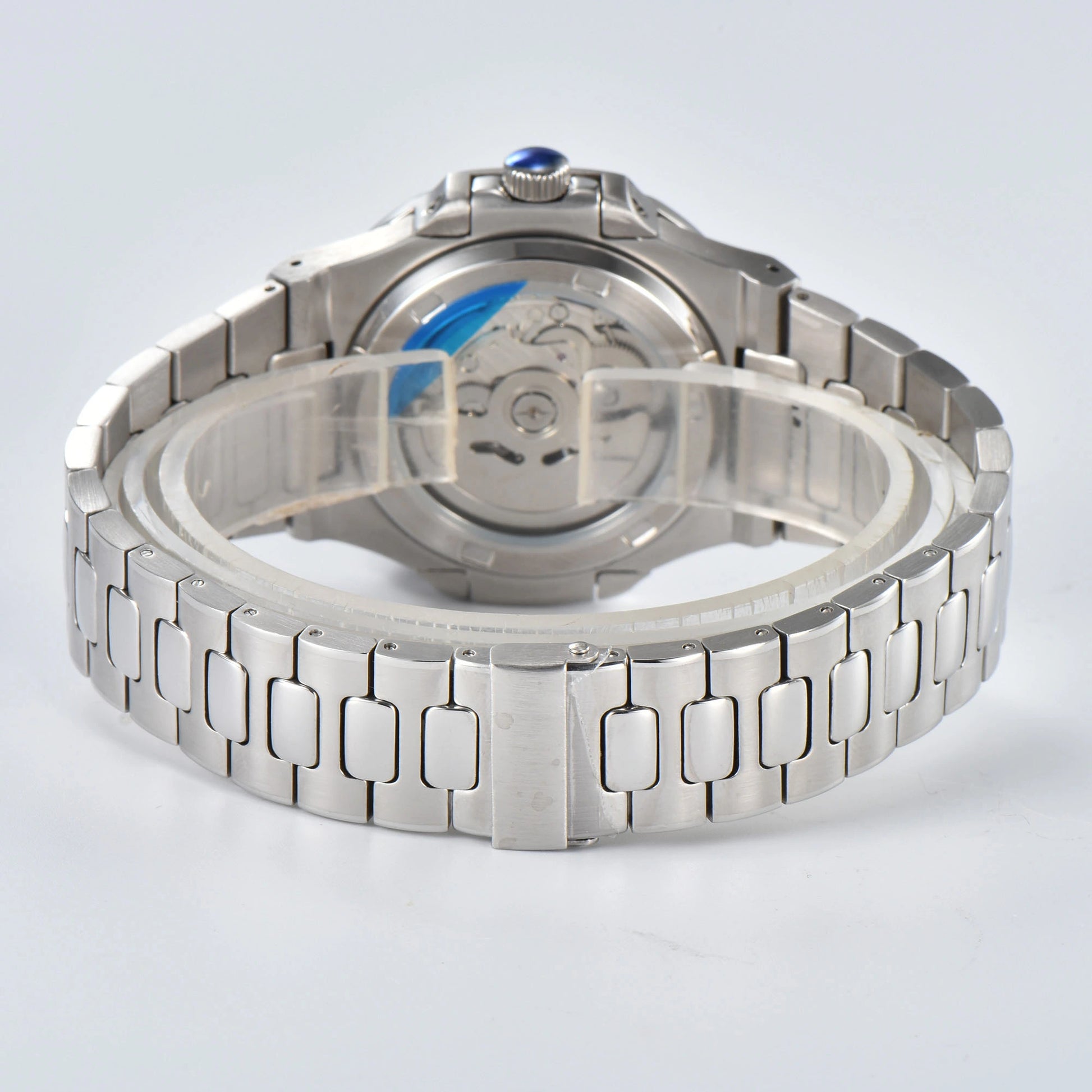 Transparent case back and deployment clasp of open heart Nautilus style Seiko mod watch with stainless steel bracelet