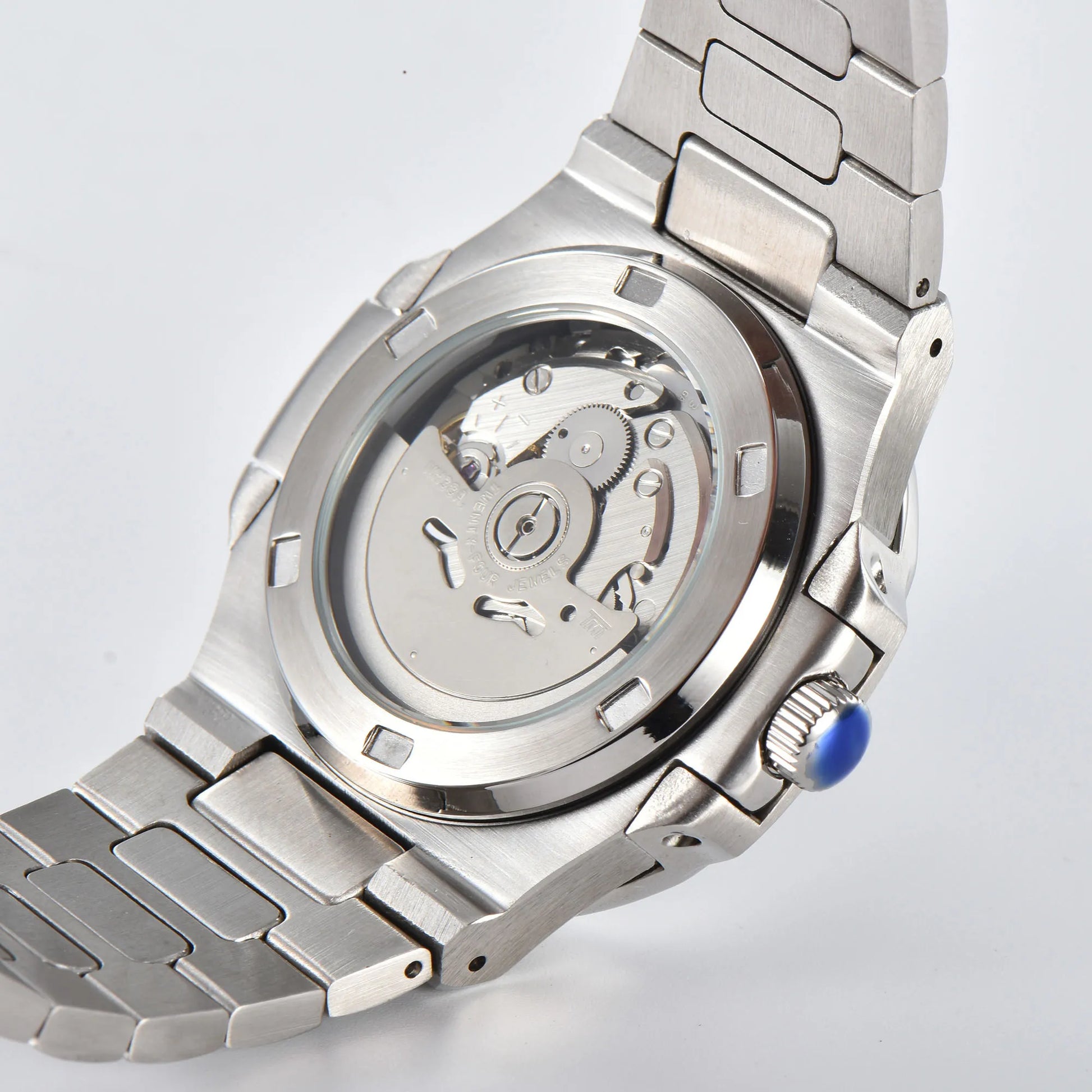 Clear case back showing Seiko NH38 automatic movement in open heart Nautilus style Seiko mod watch