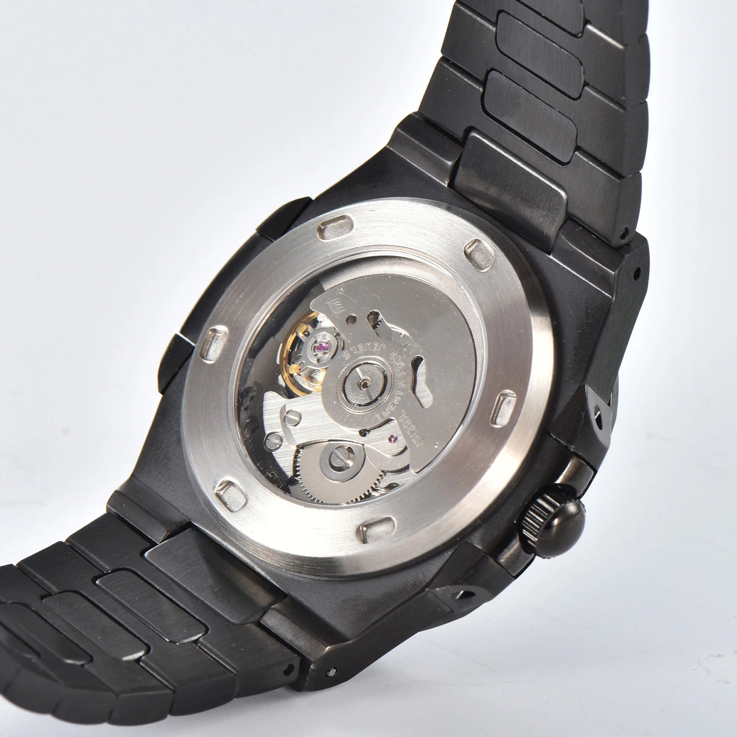 Clear case back showing Seiko NH38 automatic movement in open heart Nautilus style Seiko mod watch